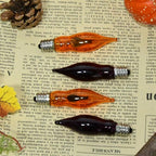 12 Pack C7 Clear Orange and Purple Flickering Flame Replacement Bulbs for String Lights Outdoor, E12 Screw Base, Flame Bulbs for Halloween Indoor Outdoor Roofline Garden Patio Party Decorations